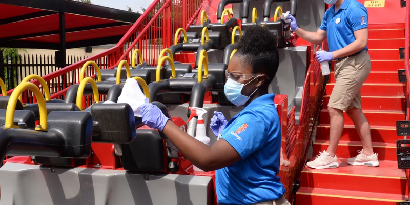 staff at Six Flags maintaining rides